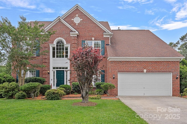 3830 Waters Reach Ln, Indian Trail, NC 28079 - view of front of property featuring concrete driveway, brick siding, a front yard, and roof with shingles