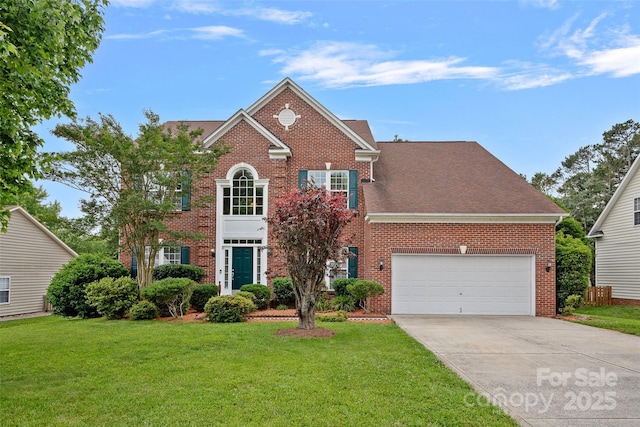 3830 Waters Reach Ln, Indian Trail, NC 28079 - view of front of property featuring brick siding, concrete driveway, and a front lawn