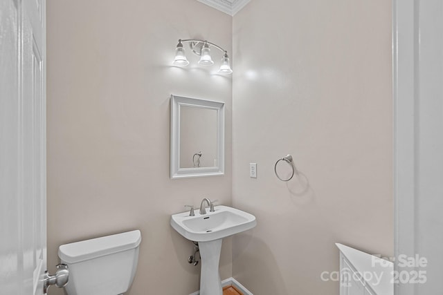 3830 Waters Reach Ln, Indian Trail, NC 28079 - half bathroom featuring toilet and crown molding