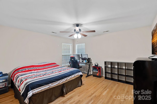 3830 Waters Reach Ln, Indian Trail, NC 28079 - bedroom featuring wood finished floors and a ceiling fan