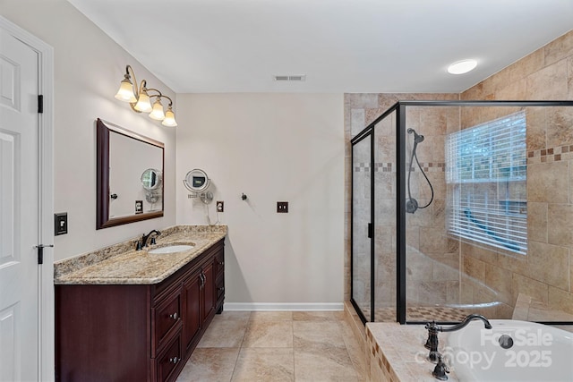3830 Waters Reach Ln, Indian Trail, NC 28079 - full bath featuring vanity, a tub to relax in, and a stall shower