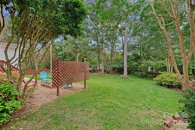 3830 Waters Reach Ln, Indian Trail, NC 28079 - fenced backyard with view of scattered trees