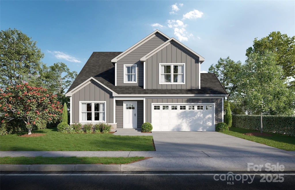 LOT1 Scotch Irish Ln, Troutman, NC 28166 - view of front facade with board and batten siding, concrete driveway, a front lawn, and a shingled roof