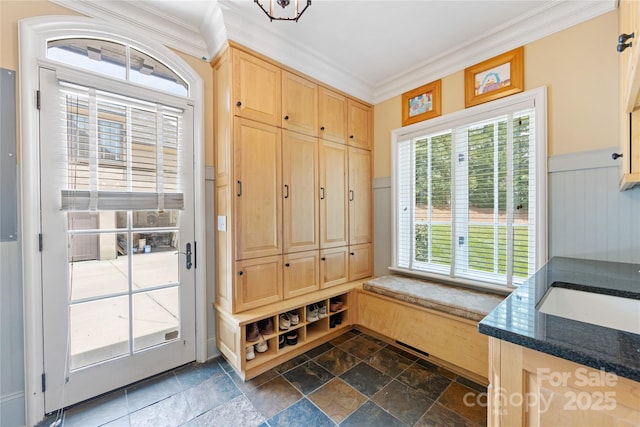 1728 Shadow Forest Dr, Matthews, NC 28105 - mudroom with ornamental molding and dark stone finish floors