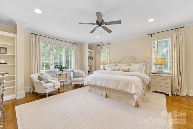 1728 Shadow Forest Dr, Matthews, NC 28105 - bedroom featuring ornamental molding, wood finished floors, baseboards, recessed lighting, and ceiling fan