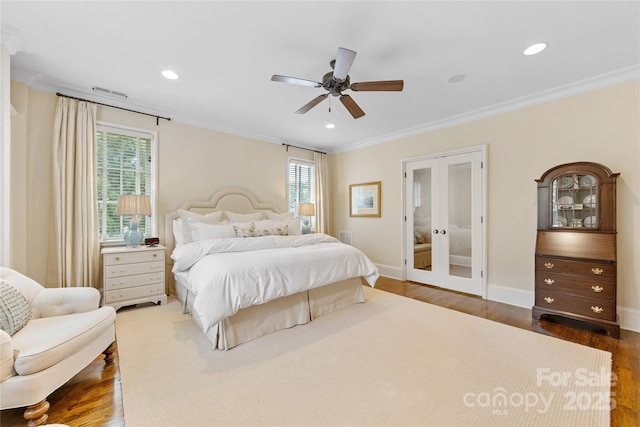 1728 Shadow Forest Dr, Matthews, NC 28105 - bedroom featuring ornamental molding, dark wood-type flooring, baseboards, french doors, and recessed lighting
