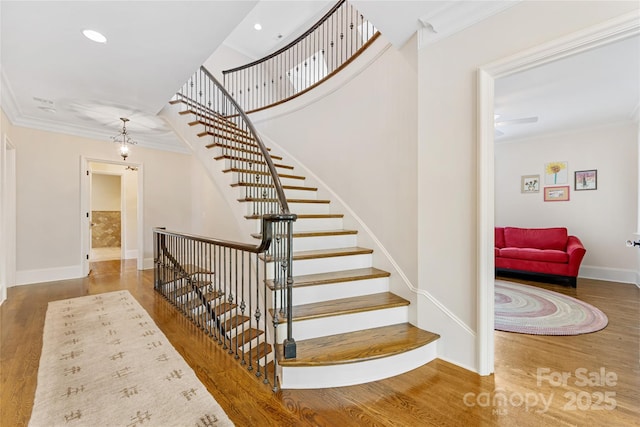 1728 Shadow Forest Dr, Matthews, NC 28105 - stairs featuring crown molding, wood finished floors, baseboards, and recessed lighting