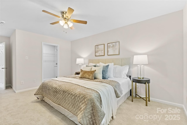 3008 Cornflower Ln, Indian Trail, NC 28079 - bedroom with light carpet, ceiling fan, and a spacious closet