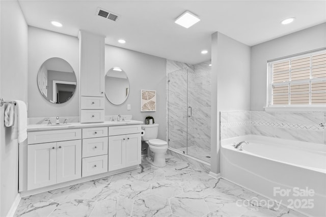 3008 Cornflower Ln, Indian Trail, NC 28079 - full bathroom with a garden tub, a marble finish shower, double vanity, marble finish floors, and recessed lighting