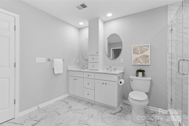 3008 Cornflower Ln, Indian Trail, NC 28079 - bathroom featuring double vanity, a marble finish shower, marble finish flooring, and recessed lighting