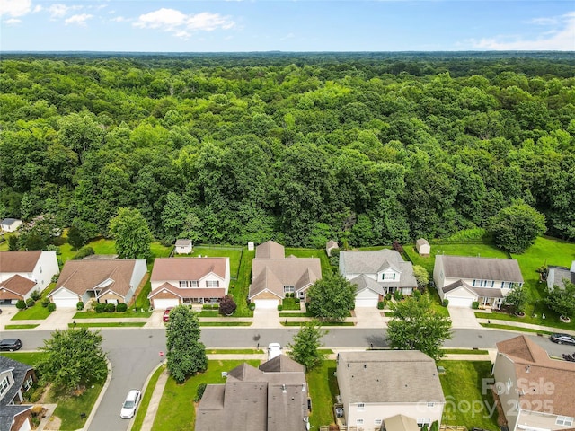 3008 Cornflower Ln, Indian Trail, NC 28079 - aerial perspective of suburban area with a heavily wooded area