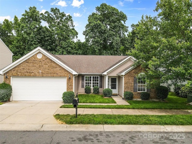3008 Cornflower Ln, Indian Trail, NC 28079 - ranch-style home with brick siding, an attached garage, concrete driveway, a front lawn, and roof with shingles