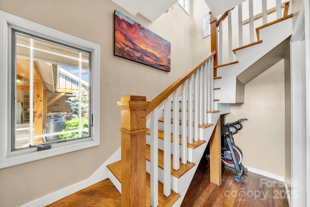 540 Upper Paw Paw Rd, Marshall, NC 28753 - staircase featuring baseboards and wood finished floors