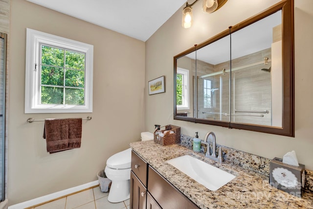 540 Upper Paw Paw Rd, Marshall, NC 28753 - bathroom featuring healthy amount of natural light, vanity, tile patterned floors, and toilet