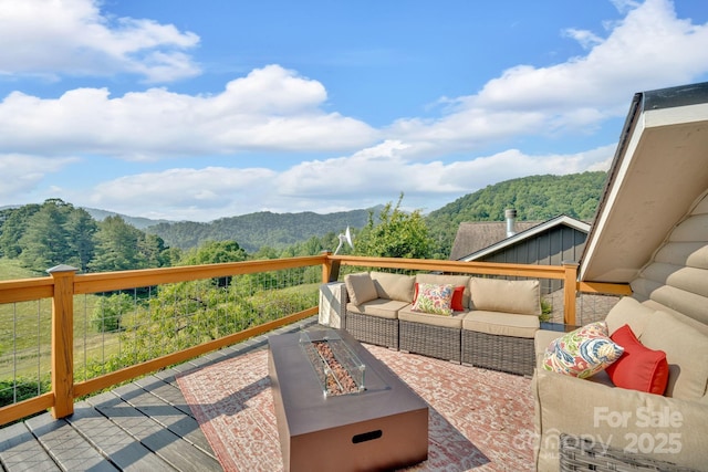 540 Upper Paw Paw Rd, Marshall, NC 28753 - wooden terrace with an outdoor living space with a fire pit, a mountain view, and a forest view
