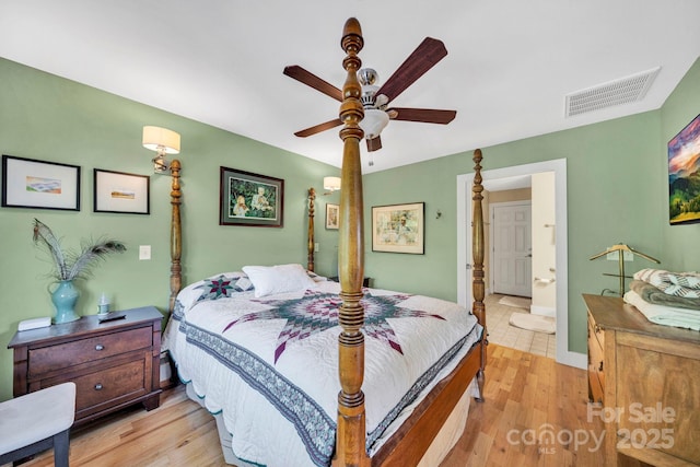540 Upper Paw Paw Rd, Marshall, NC 28753 - bedroom with light wood-style floors, baseboards, and a ceiling fan
