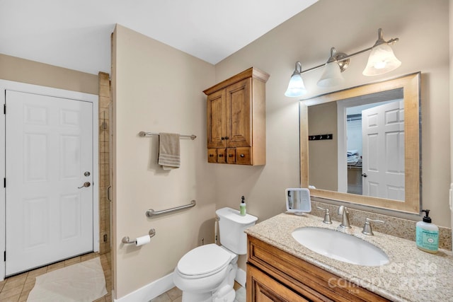 540 Upper Paw Paw Rd, Marshall, NC 28753 - bathroom featuring vanity, toilet, tile patterned flooring, and baseboards