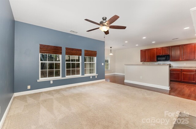 237 Lylic Woods Dr, Fort Mill, SC 29715 - unfurnished living room with ceiling fan, dark colored carpet, baseboards, and recessed lighting
