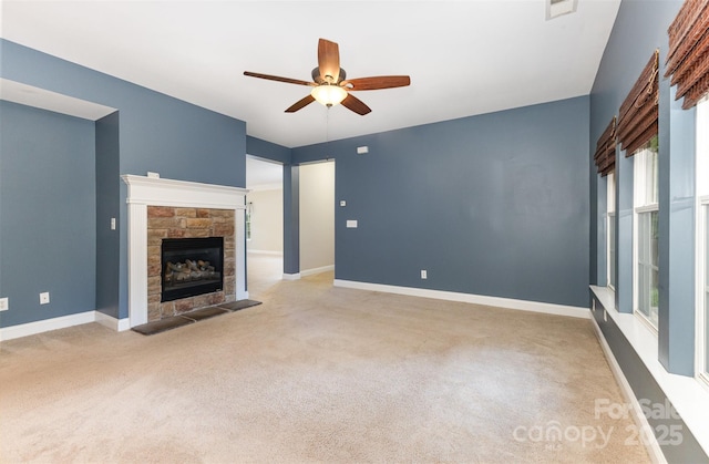 237 Lylic Woods Dr, Fort Mill, SC 29715 - unfurnished living room featuring carpet, a ceiling fan, and a fireplace