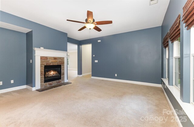 237 Lylic Woods Dr, Fort Mill, SC 29715 - unfurnished living room featuring carpet floors, a ceiling fan, a fireplace, and baseboards