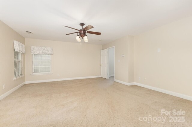 237 Lylic Woods Dr, Fort Mill, SC 29715 - unfurnished room with light colored carpet, a ceiling fan, and baseboards