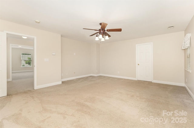 237 Lylic Woods Dr, Fort Mill, SC 29715 - spare room featuring light colored carpet, ceiling fan, baseboards, and a smoke detector