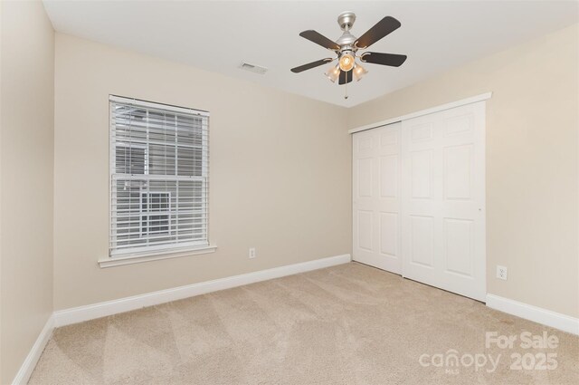 237 Lylic Woods Dr, Fort Mill, SC 29715 - unfurnished bedroom featuring carpet floors, a closet, and baseboards