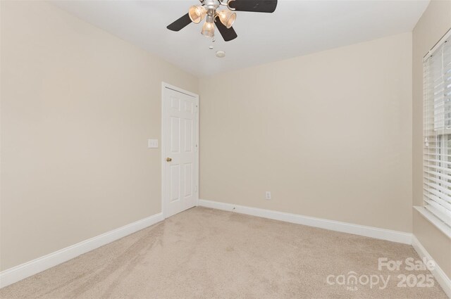 237 Lylic Woods Dr, Fort Mill, SC 29715 - unfurnished room featuring light carpet, a ceiling fan, and baseboards