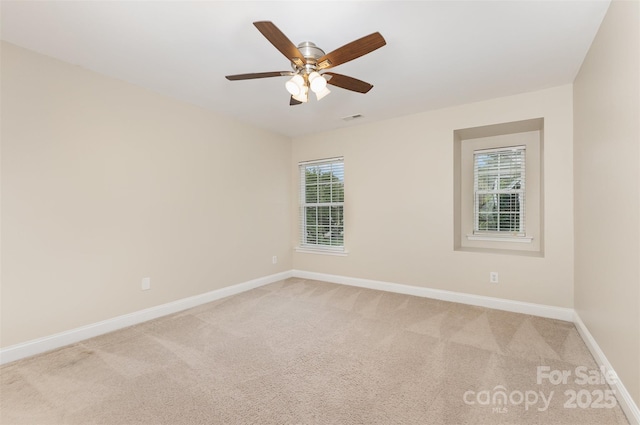 237 Lylic Woods Dr, Fort Mill, SC 29715 - unfurnished room with baseboards, plenty of natural light, and light colored carpet
