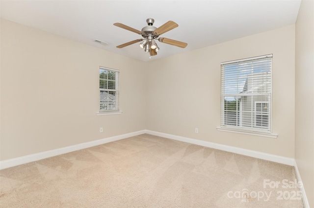 237 Lylic Woods Dr, Fort Mill, SC 29715 - spare room featuring light colored carpet, baseboards, and a ceiling fan