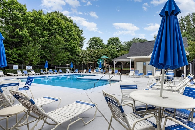 237 Lylic Woods Dr, Fort Mill, SC 29715 - community pool featuring a patio and view of wooded area