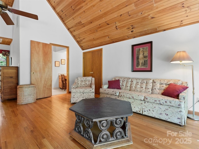 43 Hungryneck Hollow Ln, Saluda, NC 28773 - living area featuring a ceiling fan, wood ceiling, wood finished floors, and high vaulted ceiling
