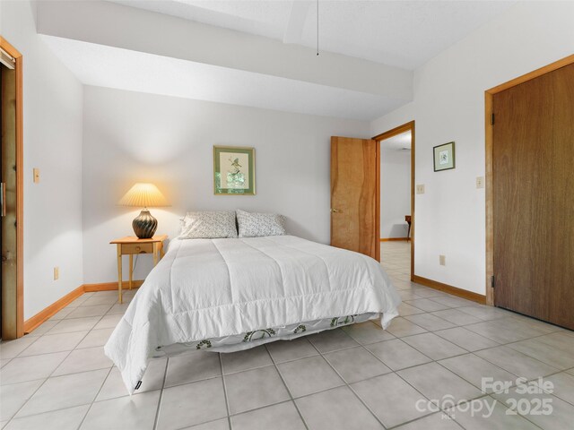 43 Hungryneck Hollow Ln, Saluda, NC 28773 - bedroom featuring light tile patterned flooring and baseboards