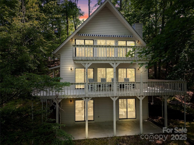 43 Hungryneck Hollow Ln, Saluda, NC 28773 - rear view of house featuring a patio area
