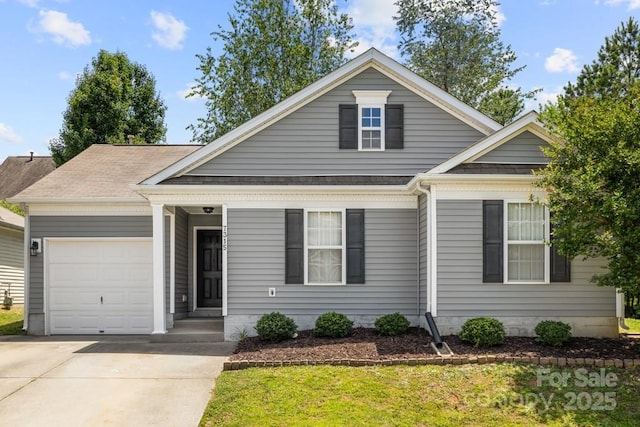 7315 Gasper Ln, Fort Mill, SC 29707 - view of front facade with an attached garage, concrete driveway, and roof with shingles