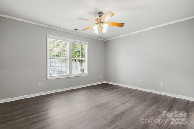 7315 Gasper Ln, Fort Mill, SC 29707 - spare room with ornamental molding, ceiling fan, dark wood-type flooring, and baseboards