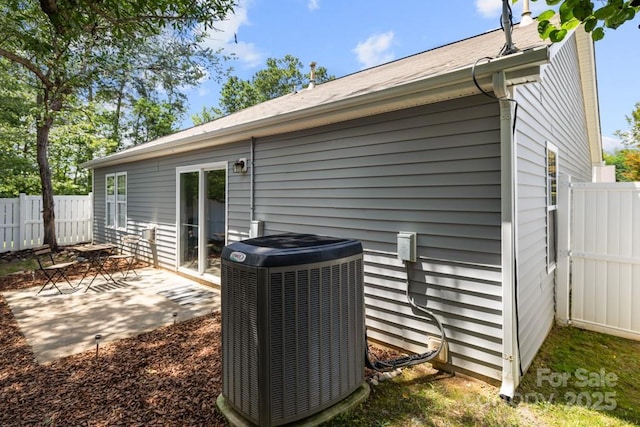 7315 Gasper Ln, Fort Mill, SC 29707 - rear view of property with central air condition unit and a patio area