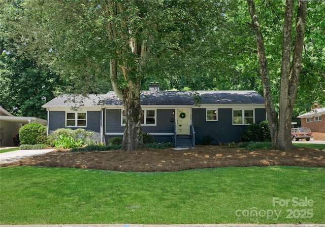 1027 Dresden Dr W, Charlotte, NC 28205 - ranch-style home with a front yard, driveway, and a chimney