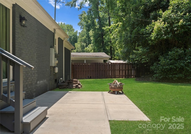 1027 Dresden Dr W, Charlotte, NC 28205 - view of yard with an outdoor fire pit and a patio area