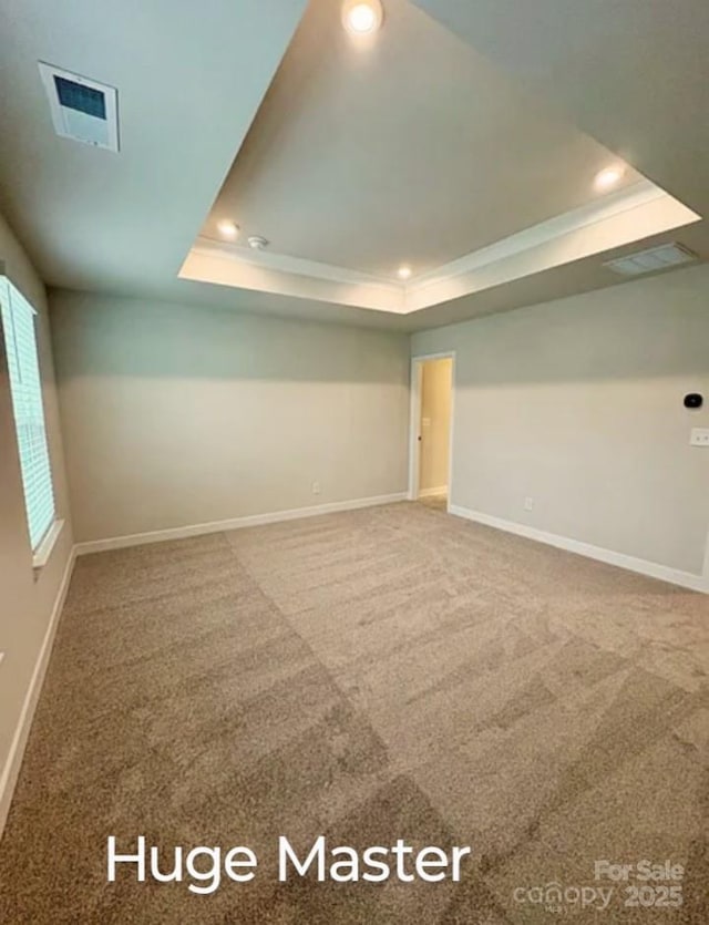 1598 Respect St, Concord, NC 28027 - carpeted empty room with a raised ceiling and recessed lighting