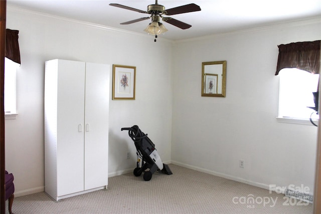 116 Woodbark Ln, Kings Mountain, NC 28086 - unfurnished bedroom with light colored carpet, ornamental molding, baseboards, and a ceiling fan