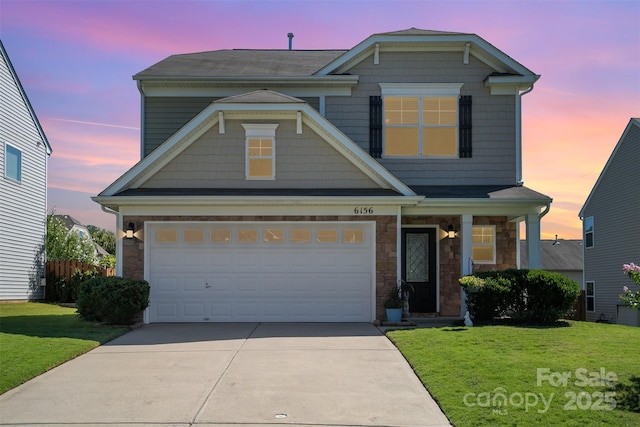 6156 Kilchurn Dr, Fort Mill, SC 29707 - view of front facade with driveway, a yard, and a garage