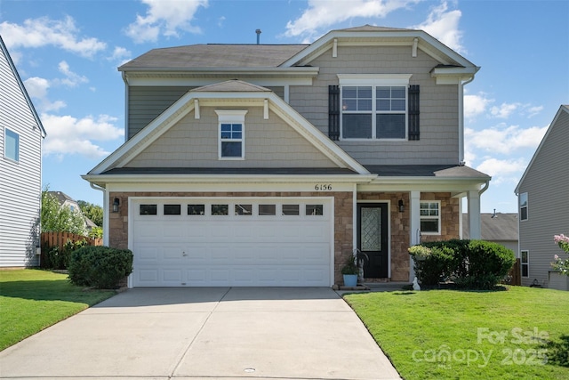 6156 Kilchurn Dr, Fort Mill, SC 29707 - view of front facade featuring concrete driveway, a garage, and stone siding