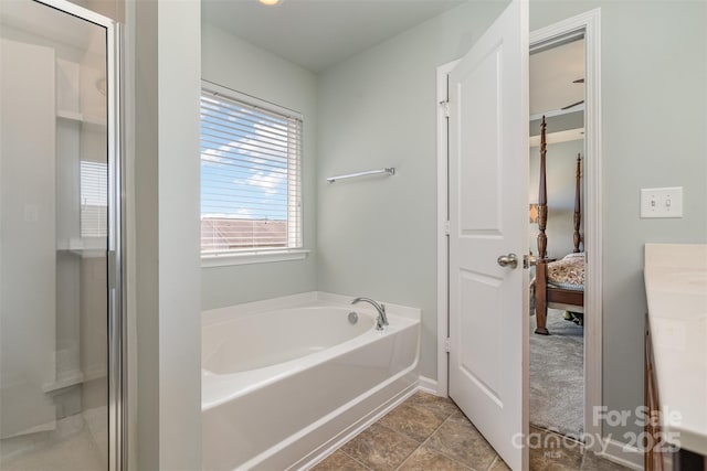 6156 Kilchurn Dr, Fort Mill, SC 29707 - ensuite bathroom with a garden tub, vanity, and a shower with shower door