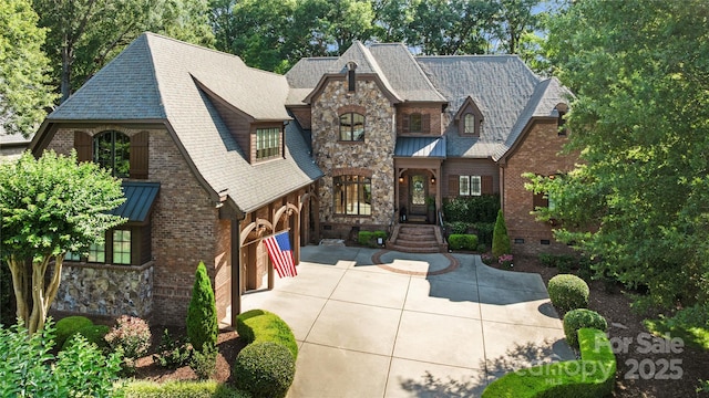 617 Beauhaven Ln, Waxhaw, NC 28173 - view of front of house with stone siding, an attached garage, concrete driveway, and brick siding
