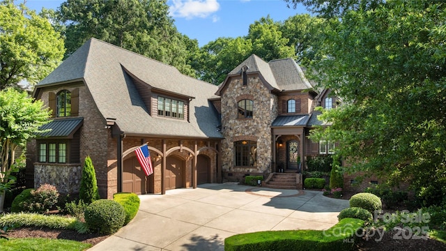 617 Beauhaven Ln, Waxhaw, NC 28173 - view of front facade featuring stone siding, concrete driveway, and a shingled roof