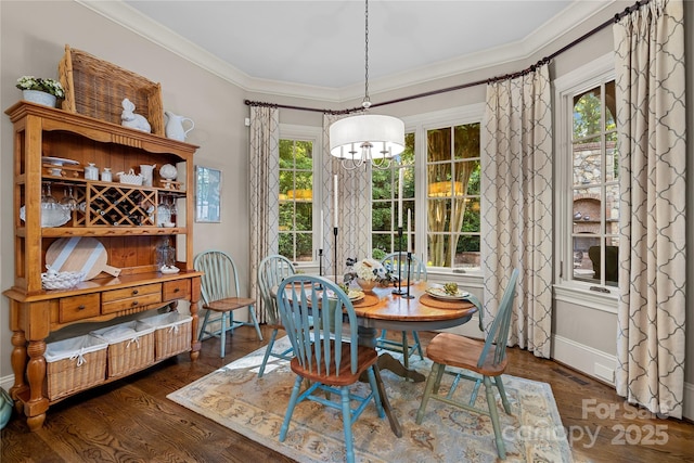 617 Beauhaven Ln, Waxhaw, NC 28173 - dining room with crown molding, healthy amount of natural light, dark wood finished floors, and a chandelier