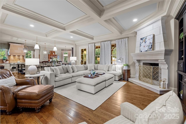 617 Beauhaven Ln, Waxhaw, NC 28173 - living room featuring wood finished floors, coffered ceiling, a fireplace, beam ceiling, and ornamental molding