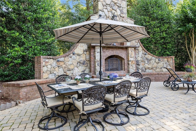 617 Beauhaven Ln, Waxhaw, NC 28173 - view of patio featuring an outdoor brick fireplace and outdoor dining area