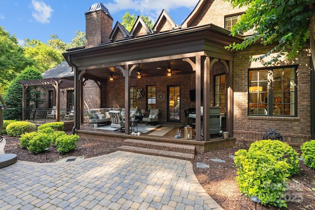 617 Beauhaven Ln, Waxhaw, NC 28173 - back of property with brick siding, a pergola, a chimney, an outdoor living space, and a patio area